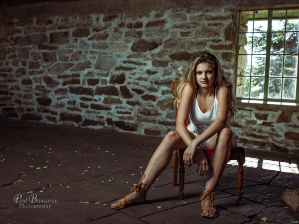 Camryn, sandals, chair, stone wall