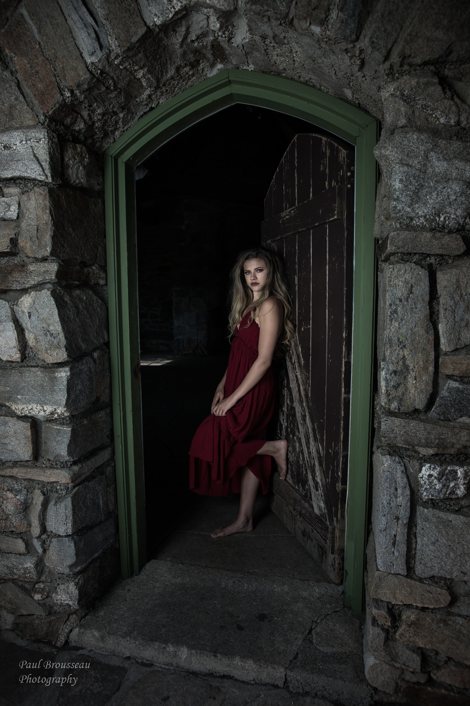 Stone Lodge, girl, red dress, barefoot doorway