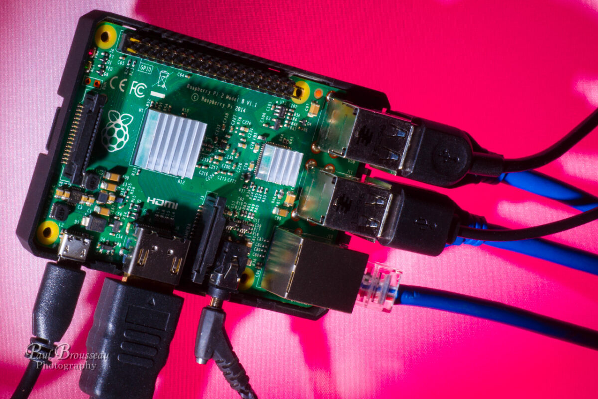 raspberry pi with ethernet, usb, HDMI, and audio cables connected