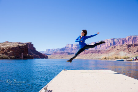 Brianna jumping on a dock
